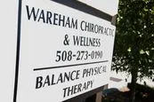 Office sign listing Wareham Chiropractic & Wellness and Balance Physical Therapy